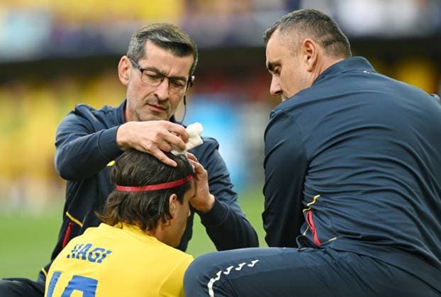 Germany Soccer Euro 2024 Romania - Netherlands 8721237 02.07.2024 Romania s Ianis Hagi receives medical attention after sustaining an injury during the UEFA EURO, EM, Europameisterschaft,Fussball 2024 round of 16 soccer match between Romania and Netherlands at the Munich Football Arena in Munich, Germany. Alexey Filippov Sputnik Munich Germany  Copyright: xAlexeyxFilippovx