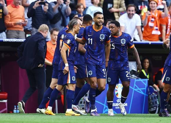Cody Gakpo of Netherlands celebrates scoring to make it 0-1 Romania v Netherlands, UEFA European Championship, EM, Europameisterschaft 2024, Round of 16, Football, Munich Football Arena, Munich, Germany - 02 Jul 2024 EDITORIAL USE ONLY No use with unauthorised audio, video, data, fixture lists, club league logos or live services. Online in-match use limited to 120 images, no video emulation. No use in betting, games or single club league player publications. Copyright: xMichaelxZemanek Shutterstockx 14566637am