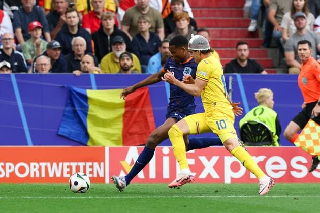 in duel, action, with Denzel Dumfries 22 Netherlands , Ianis Hagi 10 Romania , Romania vs Netherlands, Football, UEFA Euro 2024, Round of 16, M43, 02 07 2024 Munich Bavaria Germany Copyright: xkolbert-press ChristianxKolbertx