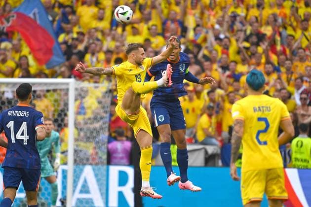 Denis DRAGUS ROM , action,duel against Virgil VAN DIJK NED Round of 16 Romania ROU Netherlands NED on 02 07 2024, Football Arena Munich Football UEFA EURO 2024 GERMANY from 14 06 2024 14 07 2024