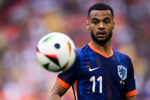 Romania v Netherlands - UEFA EURO, EM, Europameisterschaft,Fussball 2024 Cody Gakpo of Netherlands eyes the ball during the UEFA EURO 2024 round of 16 football match between Romania and Netherlands. Munich Germany Copyright: xNicolòxCampox