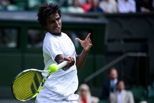 240702 And and Elias Ymer of Sweden competes in a first round singles match during day 2 of Wimbledon on July 2, 2024 in London Photo Jesper Zerman BILDBYRAN kod JZ JZ0548 tennis wimbledon aeltc day 2 bbeng  Copyright: JESPERxZERMAN BB240702JZ048