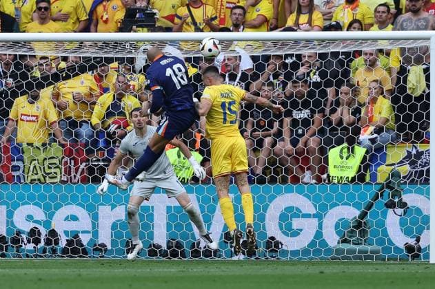 in duel, action, with Donyell Malen 18 Netherlands , Andrei Burca 15 Romania , Romania vs Netherlands, Football, UEFA Euro 2024, Round of 16, M43, 02 07 2024 Munich Bavaria Germany Copyright: xkolbert-press ChristianxKolbertx