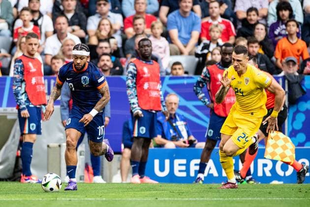 UEFA EURO 2024 Romania Netherlands 02 07 2024 Memphis Depay Netherlands, 10 , Bogdan Racotvitan Romania, 24 UEFA EURO 2024 Romania Netherlands Munich Football Arena, Munich 02 07 2024 Copyright: xBEAUTIFULxSPORTS Buriakovx