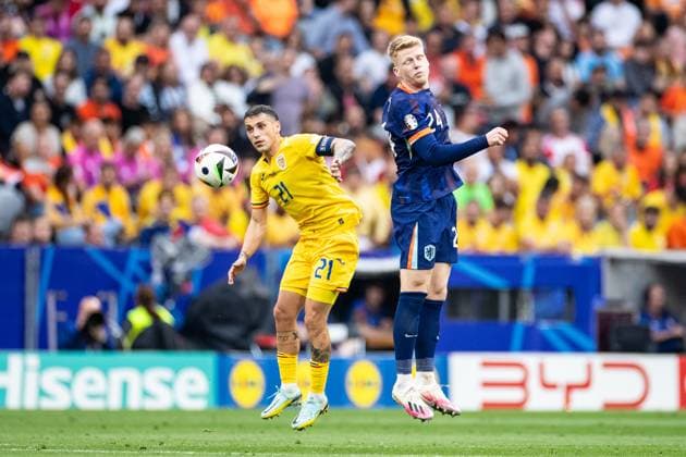 UEFA EURO 2024 Romania Netherlands 02 07 2024 Nicolae Stanicu Romania, 21 , Jerdy Schouten Netherlands, 24 UEFA EURO 2024 Romania Netherlands Munich Football Arena, Munich 02 07 2024 Copyright: xBEAUTIFULxSPORTS Buriakovx