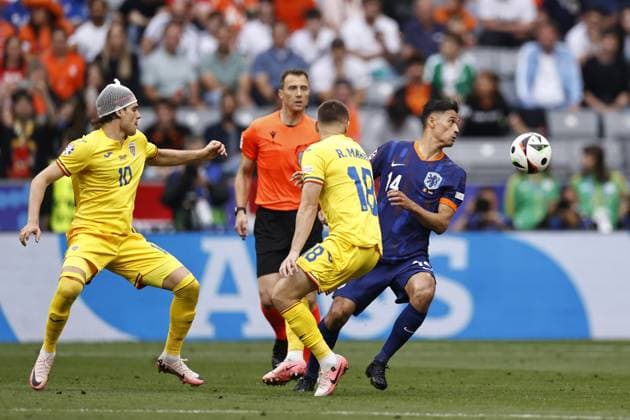 MUNICH - (l-r) Ianis Hagi of Romania, Razvan Marin of Romania, Tijjani Reijnders of Holland during the UEFA EURO, EM, Europameisterschaft,Fussball 2024 round of 16 match between Romania and the Netherlands at the Munich Football Arena on July 2, 2024 in Munich, Germany. ANP MAURICE VAN STEEN UEFA EURO 2024 2024 xVIxANPxSportx xxANPxIVx 502627396 originalFilename: 502627396.jpg