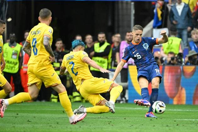 Picture shows from left to right Ratiu 2, Romania , Shot by Joey Veerman 16, Netherlands , 02 07 2024, Munich, Soccer, European Championship, Romania Netherlands, EVENT REGULATIONS PROHIBIT ANY USE OF PHOTOGRAPHS AS IMAGE SEQUENCES AND OR QUASI VIDEO xklx