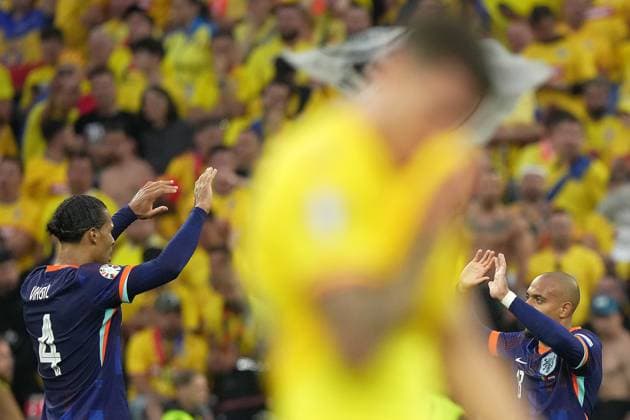 Donyell Malen of the Netherlands and Virgil van Dijk of the Netherlands .celebrate after scoring 0-3 during the Euro 2024 soccer match between Romania and Netherlands at the Munich Football Arena , Munich , Germany - Tuesday July 2 , 2024. - Soccer .  Copyright: xSpada LaPressex