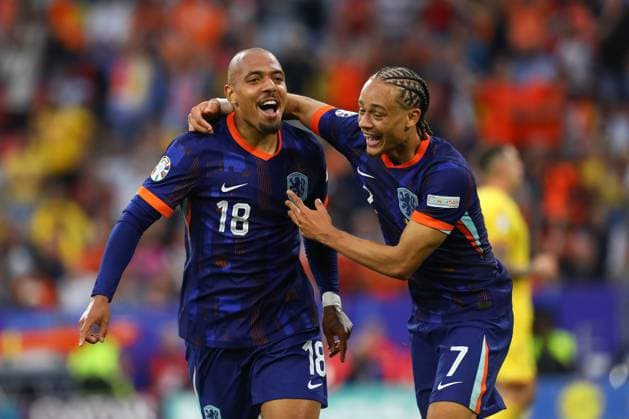 July 2, 2024, Munich, Bavaria, Germany: XAVI SIMONS 7 of Team Netherlands congratulates his teammate DONYELL MALEN 18 for scoring his side s third goal in the UEFA EURO, EM, Europameisterschaft,Fussball 2024 Round of 16 between ROMANIA and NETHERLANDS at Allianz Arena in Munich, Germany Munich Germany - ZUMAc179 20240702_zep_c179_052 Copyright: xMickaelxChavetx