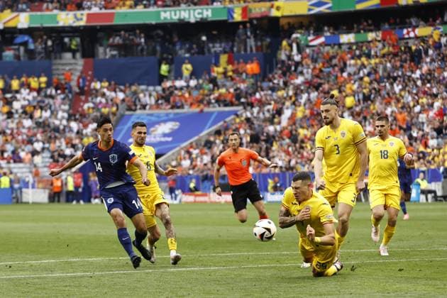 MUNICH - (l-r) Tijjani Reijnders of Holland, Marius Marin of Romania, Bogdan Racovitan of Romania, Radu Dragusin of Romania during the UEFA EURO, EM, Europameisterschaft,Fussball 2024 round of 16 match between Romania and the Netherlands at the Munich Football Arena on July 2, 2024 in Munich, Germany. ANP MAURICE VAN STEEN netherlands out - belgium out Munchen xVIxxIVx 502627436 originalFilename: 0705035058st.jpg