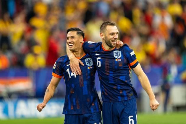 Romania v Netherlands, UEFA EURO, EM, Europameisterschaft,Fussball 2024, Munich, Germany Munich, Germany. 02nd, July 2024. Tijjani Reijnders (14) and Stefan De Vrij (6) of the Netherlands seen in celebration after the win in the UEFA Euro 2024 round of 16 match between Romania and Netherlands at Allianz Arena in Munich. Munich Germany  Copyright: xGonzalesxPhoto FrederikkexJensenx