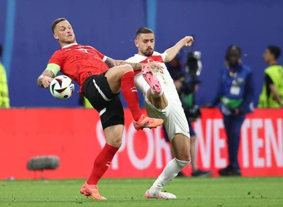 02 07 2024, xtgx, Football EM 2024 1 8 Final, Austria Turkey emspor, v l Marko Arnautovic Austria , Merih Demiral Turkey Turkey UEFA REGULATIONS PROHIBIT ANY USE OF PHOTOGRAPHS as IMAGE SEQUENCES and or QUASI VIDEO Leipzig