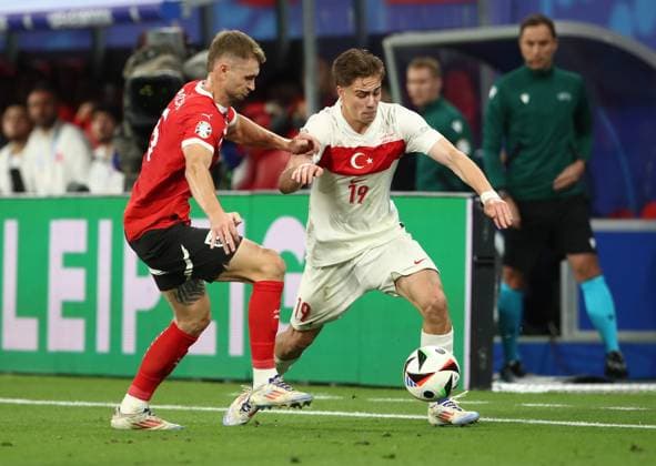 02 07 2024, xtgx, European Football Championship 2024 1 8 Final, Austria Turkey emspor, v l Stefan Posch Austria , Kenan Yildiz Turkey Turkey UEFA REGULATIONS PROHIBIT ANY USE OF PHOTOGRAPHS as IMAGE SEQUENCES and or QUASI VIDEO Leipzig