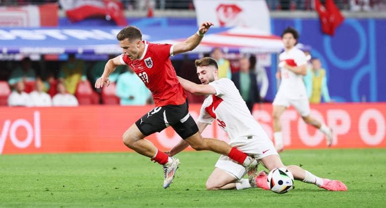 Austria Turkey UEFA EURO 2024 Leipzig, 02 07 2024, Leipzig Stadium, Football, UEFA EURO 2024 Germany , Round of 16 , Austria AUT vs Turkey TUR , Pictured from left Christoph Baumgartner 19, AUT , Ismail Yüksek Yueksek 16, TUR , For journalistic purposes only Only for editorial use , UEFA Êregulations prohibit any use of photographs as image sequences and or quasi video ,