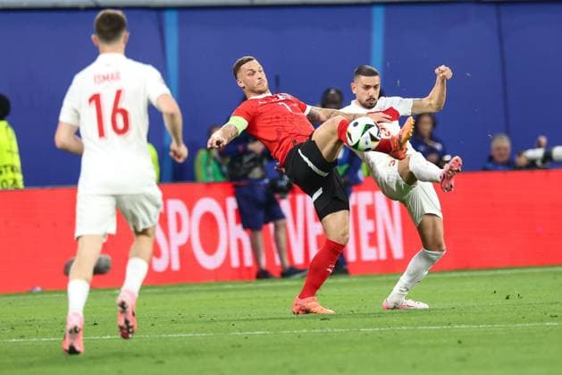 SOCCER - UEFA EURO, EM, Europameisterschaft,Fussball 2024 LEIPZIG,GERMANY,02.JUL.24 - UEFA EURO 2024, round of 16, Austria vs Turkey. Image shows Marko Arnautovic (AUT) and Merih Demiral (TUR).  GEPAxpictures xArminxRauthner