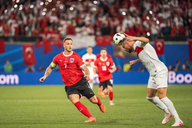 SOCCER - UEFA EURO, EM, Europameisterschaft,Fussball 2024 LEIPZIG,GERMANY,02.JUL.24 - SOCCER -UEFA EURO 2024, round of 16, Austria vs Turkey. Image shows Marko Arnautovic (AUT) and Merih Demiral (TUR).  GEPAxpictures xJohannesxFriedl