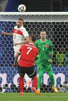 02 07 2024, xtgx, Football EM 2024 1 8 Final, Austria Turkey emspor, v l Merih Demiral Turkey Turkey , Marko Arnautovic Austria , Mert Günok Turkey Turkey UEFA REGULATIONS PROHIBIT ANY USE OF PHOTOGRAPHS as IMAGE SEQUENCES and or QUASI VIDEO Leipzig