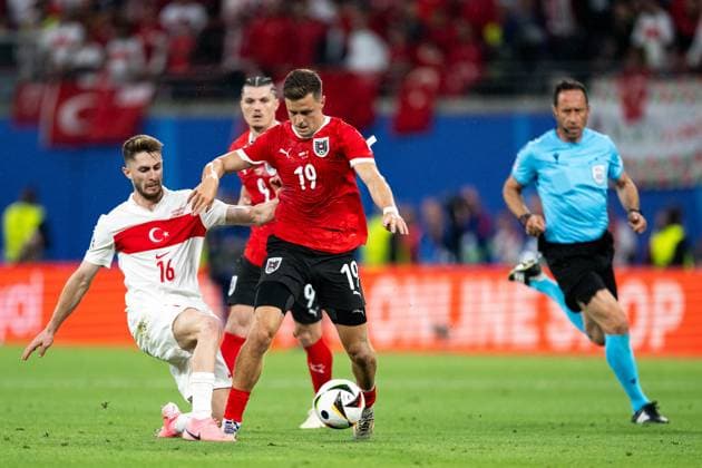 Christoph Baumgartner Austria, 19 in duel with Ismail Yueksek Turkey, 16 , GER, Austria AUT vs Tuerkiye TUR , European Football Championship, UEFA EURO 2024, Round of 16, 02 07 2024 GER, Austria AUT vs Tuerkiye TUR , European Football Championship, UEFA EURO 2024, Round of 16, 02 07 2024 Leipzig Copyright: xEibner-Pressefoto Memmlerx EP_MMR