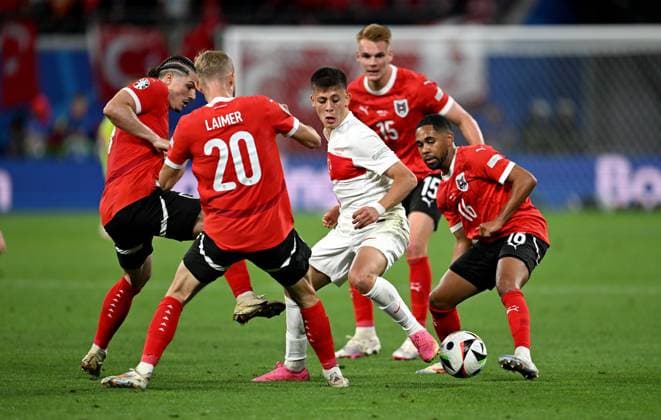 Football Euro 2024 Round of 16 02 07 2024 Austria Turkey Arda Gueler 3 from left , Turkey dances with Austria, from left, Marcel Sabitzer Austria vs Konrad Laimer Austria vs Arda Gueler Turkey vs Phillipp Mwene Austria