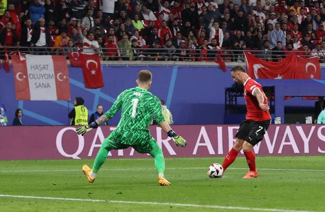 02 07 2024, xtgx, European Football Championship 2024 1 8 Final, Austria Turkey emspor, v l Mert Günok Turkey Turkey , Marko Arnautovic Austria UEFA REGULATIONS PROHIBIT ANY USE OF PHOTOGRAPHS as IMAGE SEQUENCES and or QUASI VIDEO Leipzig