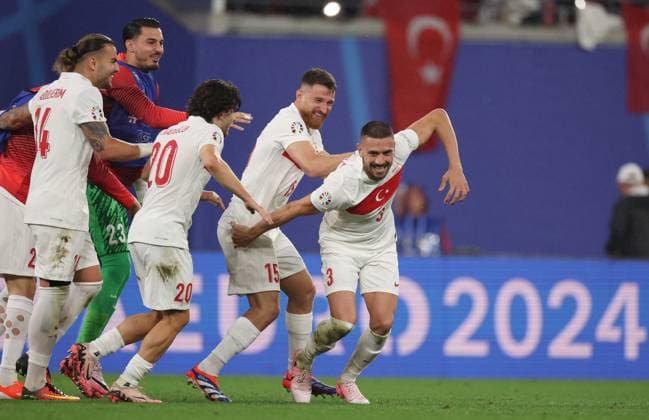 Leipzig, Germany, 2nd July 2024. Merih Demiral of Turkey (R) celebrates after scoring the second goal during the UEFA European Championships Round of 16 match at Leipzig Stadium, Leipzig. Picture credit should read: Paul Terry Sportimage EDITORIAL USE ONLY. No use with unauthorised audio, video, data, fixture lists, club league logos or live services. Online in-match use limited to 120 images, no video emulation. No use in betting, games or single club league player publications. SPI-3215-0057