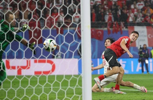 02 07 2024, xtgx, European Football Championship 2024 1 8 Final, Austria Turkey emspor, v l Mert Günok Turkey Turkey , Christoph Baumgartner Austria , Ferdi Erenay Kadioglu Turkey Turkey UEFA REGULATIONS PROHIBIT ANY USE OF PHOTOGRAPHS as IMAGE SEQUENCES and or QUASI VIDEO Leipzig