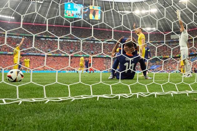 (240703) -- MUNICH, July 3, 2024 -- Cody Gakpo (front) of the Netherlands celebrates after scoring before the goal is disallowed for offside during the UEFA EURO, EM, Europameisterschaft,Fussball 2024 Round of 16 match between Romania and the Netherlands in Munich, Germany on July 2, 2024. ) (SP)GERMANY-MUNICH-FOOTBALL-EURO 2024-ROMANIA VS NETHERLANDS MengxDingbo 