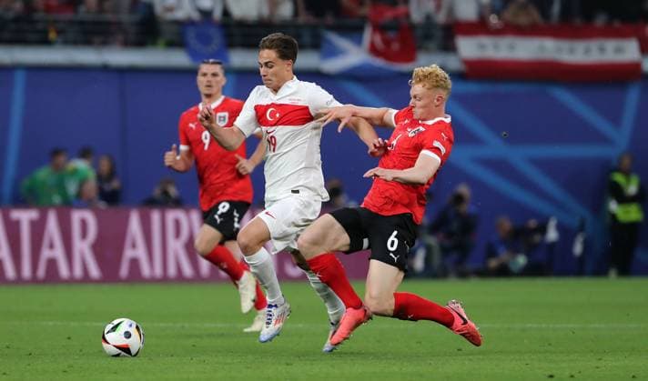 Kenan Yildiz in a duel with Nicolas Seiwald Match scene Action Sport Football European Championship Euro 2024 European Championship Men Season 2023 2024 02 07 2024 Austria AUT vs Turkey TUR in Leipzig DFL regulations prohibit any use of photographs as image sequences and or quasi video