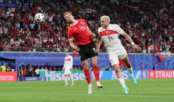 Philipp Lienhart in a duel with Baris Alper Yilmaz Match scene Action Sport Football European Football Championship Euro 2024 European Championship Men Season 2023 2024 02 07 2024 Austria AUT vs Turkey TUR in Leipzig DFL regulations prohibit any use of photographs as image sequences and or quasi video