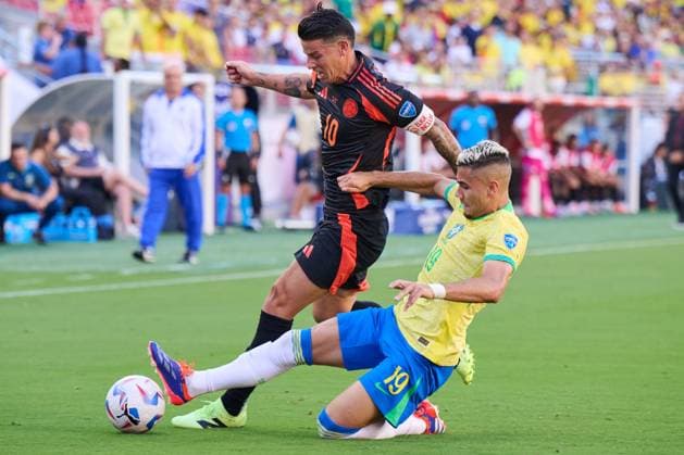 RECORD DATE NOT STATED Copa America USA 2024 Brazil vs Colombia James Rodriguez (L) of Colombia fights for the ball with Andreas Pereira (R) of Brazil during the game between Brazil and Colombia as part of the CONMEBOL Copa America USA 2024 group D, at Levis Stadium, on July 02, 2024 in Santa Clara, California, United States. SANTA CLARA CALIFORNIA UNITED STATES  Copyright: xJorgexMartinezx 20240702212955_CA_GD_2024_BRA_COL_RODRIGUEZ118