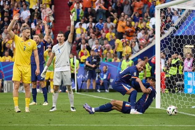 (240703) -- MUNICH, July 3, 2024 -- Cody Gakpo (1st R) of the Netherlands celebrates after scoring before the goal is disallowed due to being offside during the UEFA EURO, EM, Europameisterschaft,Fussball 2024 Round of 16 match between Romania and the Netherlands in Munich, Germany on July 2, 2024. ) (SP)GERMANY-MUNICH-FOOTBALL-EURO 2024-ROMANIA VS NETHERLANDS MengxDingbo 