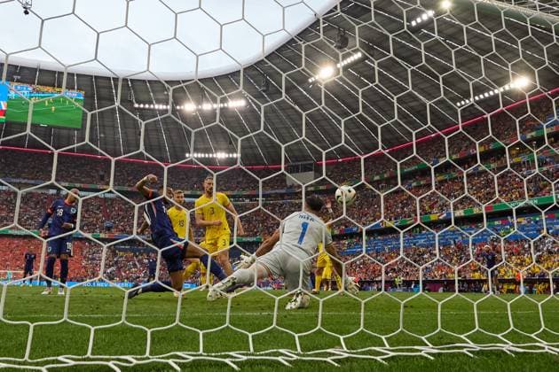 (240703) -- MUNICH, July 3, 2024 -- Cody Gakpo (front 2nd L) of the Netherlands shoots and scores before the goal is disallowed due to being offside during the UEFA EURO, EM, Europameisterschaft,Fussball 2024 Round of 16 match between Romania and the Netherlands in Munich, Germany on July 2, 2024. ) (SP)GERMANY-MUNICH-FOOTBALL-EURO 2024-ROMANIA VS NETHERLANDS MengxDingbo 