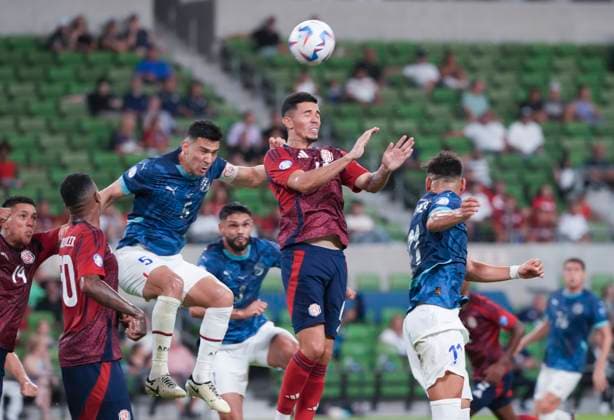 July 2, 2024, Austin, Tx, United States: Paraguay s FABIAN BALBUENA (5, blue) fights for a header with JEFFERSON BRENES (13, red) of Costa Rica during the 63rd minute of the second half in Group D CONMEBOL Copa America action with Paraguay challenging Costa Rica at Austin s Q2 Stadium on July 2, 2024. Costa Rica edged out a 2-1 victory to possibly advance out of group play. Austin United States - ZUMAd150 20240702_znp_d150_016 Copyright: xBobxDaemmrichx