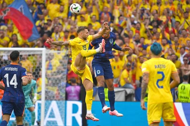 Denis DRAGUS ROM , action,duel against Virgil VAN DIJK NED Round of 16 Romania ROU Netherlands NED 0 3 on 02 07 2024, Football Arena Munich Football UEFA EURO 2024 GERMANY from 14 06 2024 14 07 2024