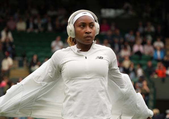 Lawn Tennis - 2024 Wimbledon Championship - Anca Todoni (ROU) v Coco Gauff (USA) - All England Lawn Tennis & Croquet Club - Wednesday 3rd July 2024 Coco Gauff (USA) prepares for the match with head phones 
