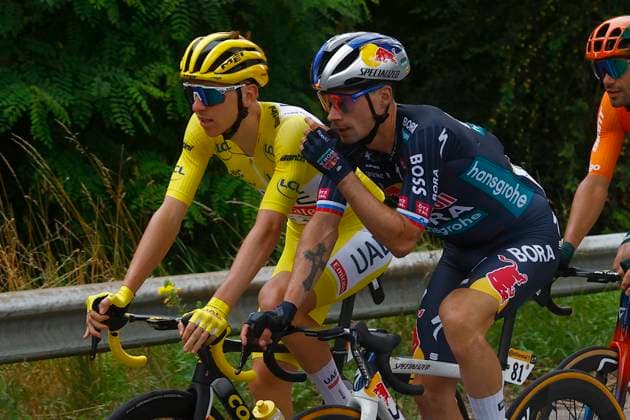 Tour de France 2024 - Stage 05 SAINT-VULBAS, FRANCE - JULY 03 : Pogacar Tadej (SVN) of UAE Team Emirates and Roglic Primoz (SVN) of RED BULL - BORA - HANSGROHE during stage 5 of the 111th edition of the Tour de France 2024 cycling race, a stage of 177,5 kms with start in Saint-Jean-De-Maurienne and finish in Saint-Vulbas on July 03, 2024 in Saint-Vulbas, France, 03 07 2024 Saint-Vulbas France  Copyright: xLucaxBettinix