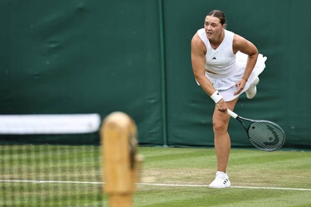 Jule Niemeier, GER, during rain delayed first round of 2024 All England Lawn Tennis Championships at Wimbledon, womens singles, London, 03 07 2024