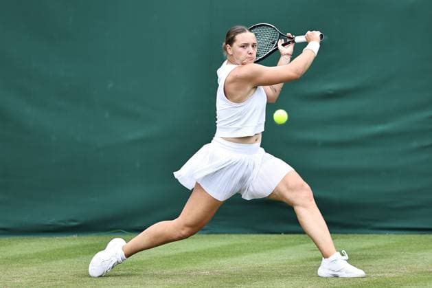 Jule Niemeier, GER, during rain delayed first round of 2024 All England Lawn Tennis Championships at Wimbledon, womens singles, London, 03 07 2024