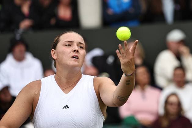 Jule Niemeier, GER, during rain delayed first round of 2024 All England Lawn Tennis Championships at Wimbledon, womens singles, London, 03 07 2024