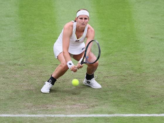 Belgian Minnen pictured in action during a tennis match against Italian Paolini, in the second round of the women s singles competition of the 2024 Wimbledon grand slam tournament at the All England Tennis Club, in south-west London, Britain, Wednesday 03 July 2024. BENOITxDOPPAGNE  x95783141x