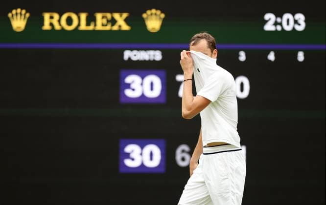 (240704) -- LONDON, July 4, 2024 -- Daniil Medvedev of Russia reacts during the men s singles second round match between Daniil Medvedev of Russia and Alexandre Muller of France at Wimbledon tennis Championship in London, Britain, July 3, 2024. ) (SP)BRITAIN-LONDON-TENNIS-WIMBLEDON-MEN S SINGLES LixYing 