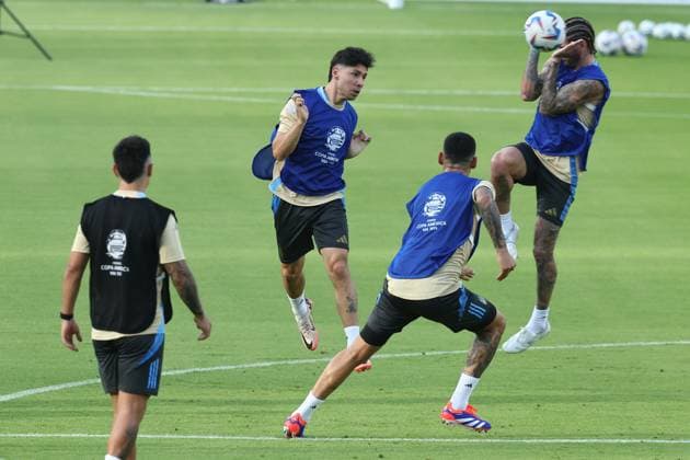 Argentina s defender Gonzalo Montiel C heads the ball over midfielder Rodrigo de Paul R during a training session ahead of the match against Ecuador for the Copa America USA 2024 quarterfinal match, at Shell Energy Stadium in Houston, TX, on July 3, 2024 HOUSTON UNITED STATES Copyright: xALEJANDROxPAGNIx
