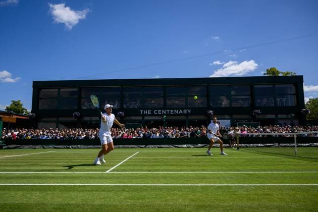 240704 Casper Ruud of Norway and William Blumberg of USA compete in a first round doubles match during day 4 of Wimbledon on July 4, 2024 in London Photo Jesper Zerman BILDBYRAN kod JZ JZ0550 tennis wimbledon dag 4 bbeng  Copyright: JESPERxZERMAN BB240704JZ019