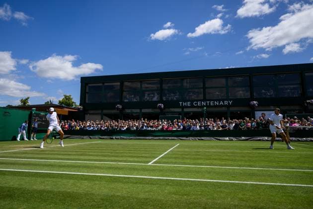 240704 Casper Ruud of Norway and Joe Salisbury of Great Britain compete in a first round doubles match during day 4 of Wimbledon on July 4, 2024 in London Photo Jesper Zerman BILDBYRAN kod JZ JZ0550 tennis wimbledon dag 4 bbeng  Copyright: JESPERxZERMAN BB240704JZ027