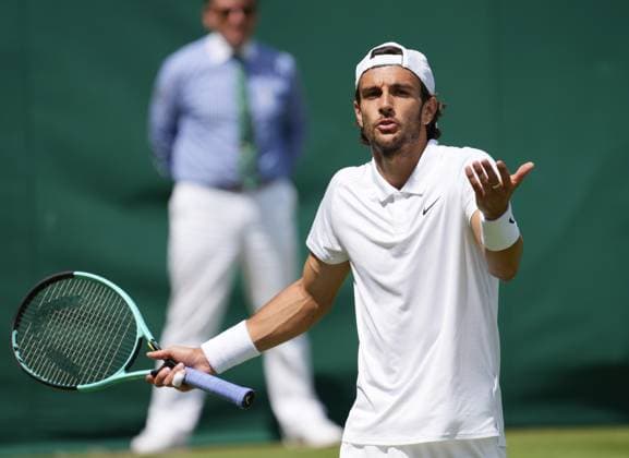 Lawn Tennis - 2024 Wimbledon Championship Luciano Darderi (ITA) v Lorenzo Mussetti (ITA)- All England Lawn Tennis & Croquet Club - Thursday 4th July 2024 Lorenzo Mussetti argues the point 