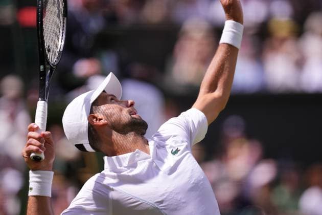 Serbia s Novak Djokovic serves the ball to Britain s Jacob Feamley during their men s singles tennis match on the fourth day of the 2024 Wimbledon Championships at The All England Lawn Tennis and Croquet Club in Wimbledon, southwest London, on July 4, 2024.  Copyright: xHiroshixSatox