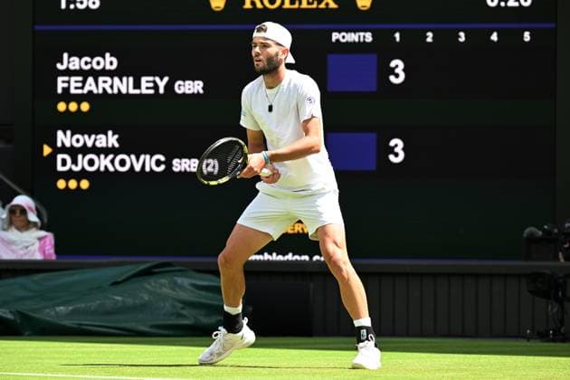 Jacob Fearnley of Great Britain plays Novak Djokovic of Serbia plays in the third round of the Wimbledon tennis mens singles championships held at the All England Lawn Tennis & Croquet Club. Featuring: Jacob Fearnley of Great Britain Where: London, London, United Kingdom When: 04 Jul 2024 Credit: Ray Tang Cover Images **STRICTLY EDITORIAL USE ONLY** EDITORIAL USE ONLY. RESTRICTED TO NEWSPAPERS BASED IN THE UK Copyright: xx coverimg53920862