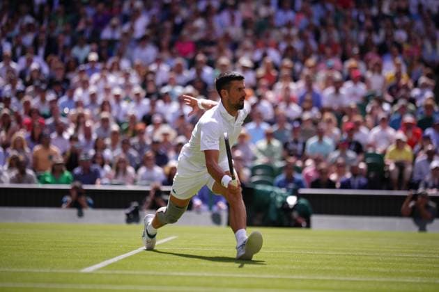 Serbia s Novak Djokovic hits a forehand volley to Britain s Jacob Feamley during their men s singles tennis match on the fourth day of the 2024 Wimbledon Championships at The All England Lawn Tennis and Croquet Club in Wimbledon, southwest London, on July 4, 2024.  Copyright: xHiroshixSatox
