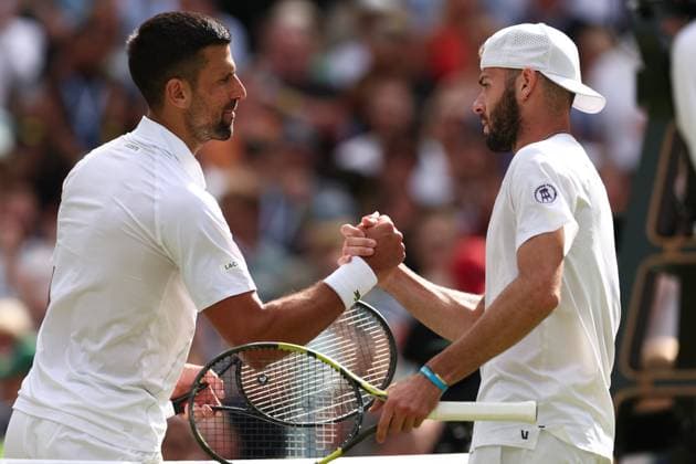 4th July 2024; All England Lawn Tennis and Croquet Club, London, England; Wimbledon Tennis Tournament, Day 4; Novak Djokovic (SRB) shakes hands with Jacob Fearnley (GBR) after he wins his second round match  ActionPlus12663731 ShaunxBrooks