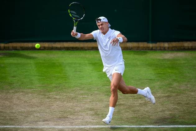 240704 Holger Rune of Denmark competes in a second round singles match during day 4 of Wimbledon on July 4, 2024 in London Photo Jesper Zerman BILDBYRAN kod JZ JZ0550 tennis wimbledon dag 4 bbeng  Copyright: JESPERxZERMAN BB240704JZ069